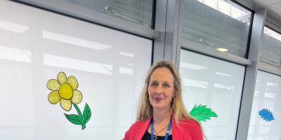 Deborah Tomlinson standing in the the NI Cancer Centre